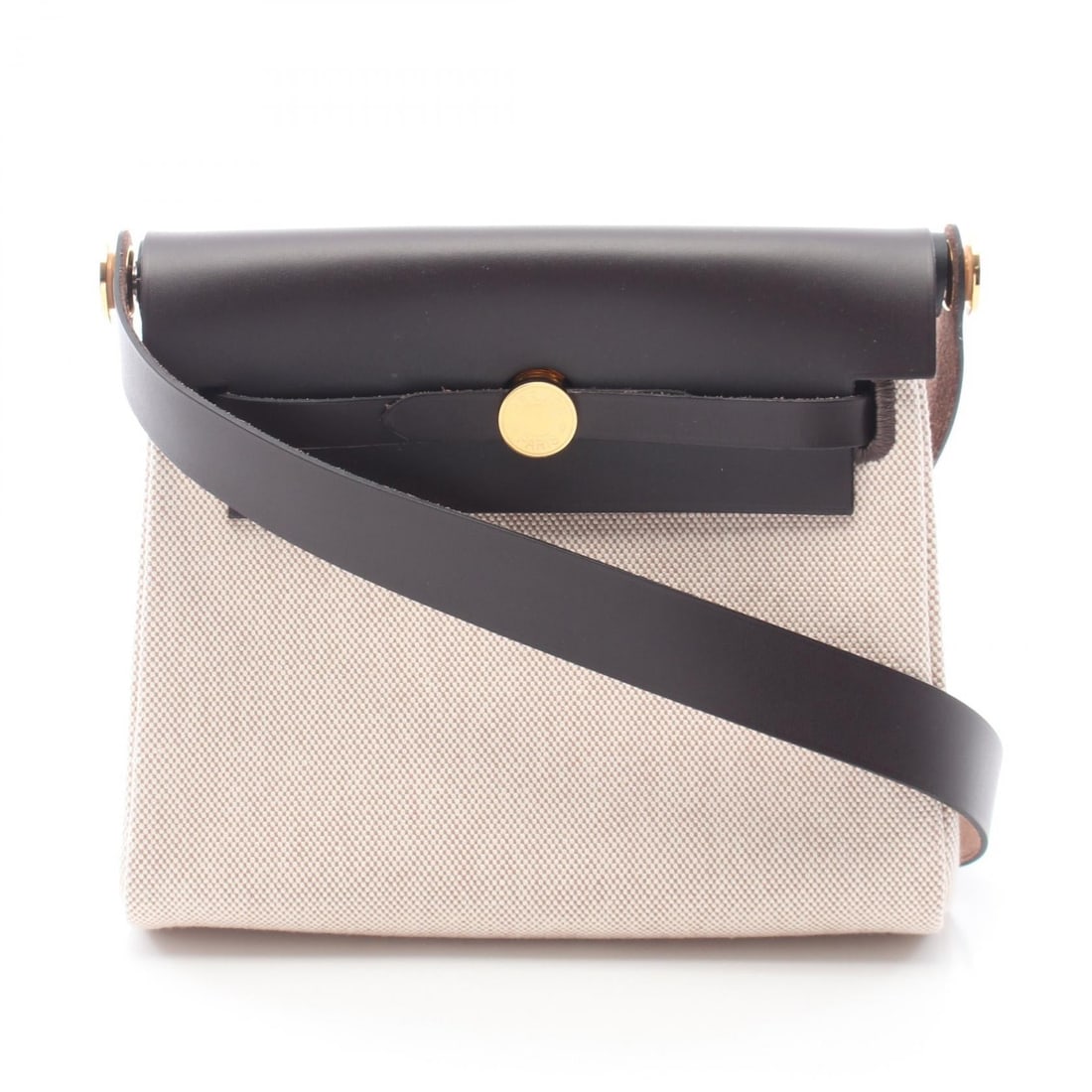Hermes Airbag Zip Mini Ecru Ebene: Authentic and authenticated Hermes Airbag Zip Mini shoulder bag in ivory and dark brown Vache hunter Toile H canvas with gold hardware. Model 085414CC. Approx. 16H x 19/20W x 7D cm. Includes stopper,