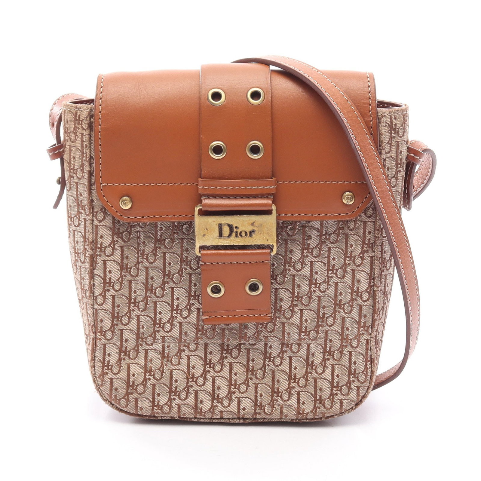 Dior Street Chic Trotter Beige: Authentic and authenticated Christian Dior Street Chic Trotter shoulder bag in beige/brown canvas and leather. Approx. 20.5H x 16W x 5.5D cm with 116-130 cm strap. No accessories listed.