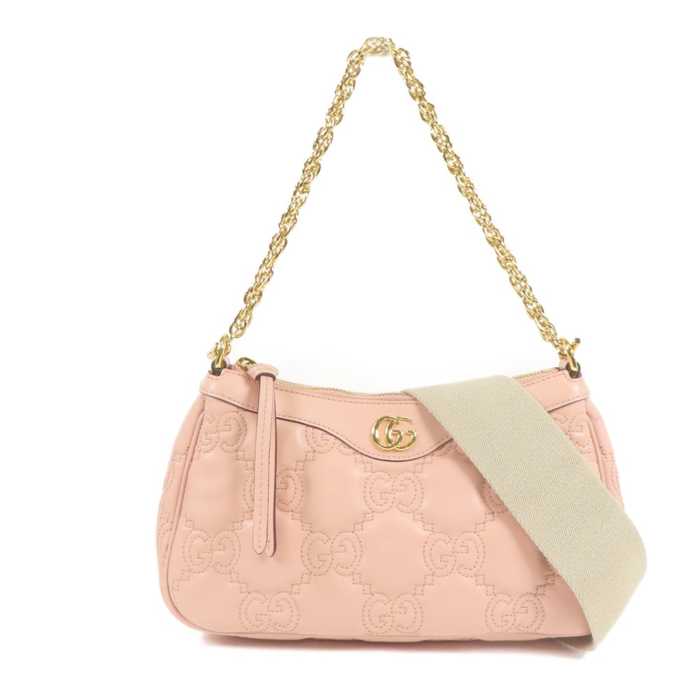 Gucci GG Matelasse Chain Bag Pink: Pink and light pink calfskin Gucci GG Matelasse chain shoulder bag with shoulder strap. Approx. 25 x 14 x 6 cm; strap 41-110 cm. Product no. 525040. Authentic and authenticated.