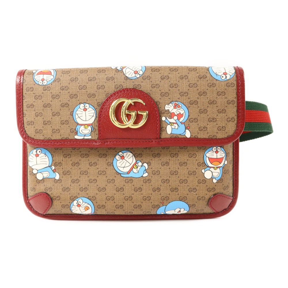 Gucci Doraemon Waist Bag Brown: Authenticated genuine Gucci Doraemon x Gucci waist bag in brown PVC coated canvas with gold-tone hardware. Product no. 525040. Approx. W24 x H16 x D2 cm; shoulder 85-148 cm.
