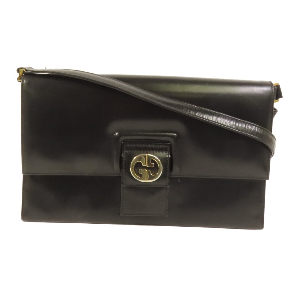 Gucci Vintage Clutch Shoulder: Gucci Vintage Clutch Shoulder Bag. Color: Black / Black. Material: Calfskin. Size: 25 X 14.5 X 4 Cm. Shoulder: 81 Cm.