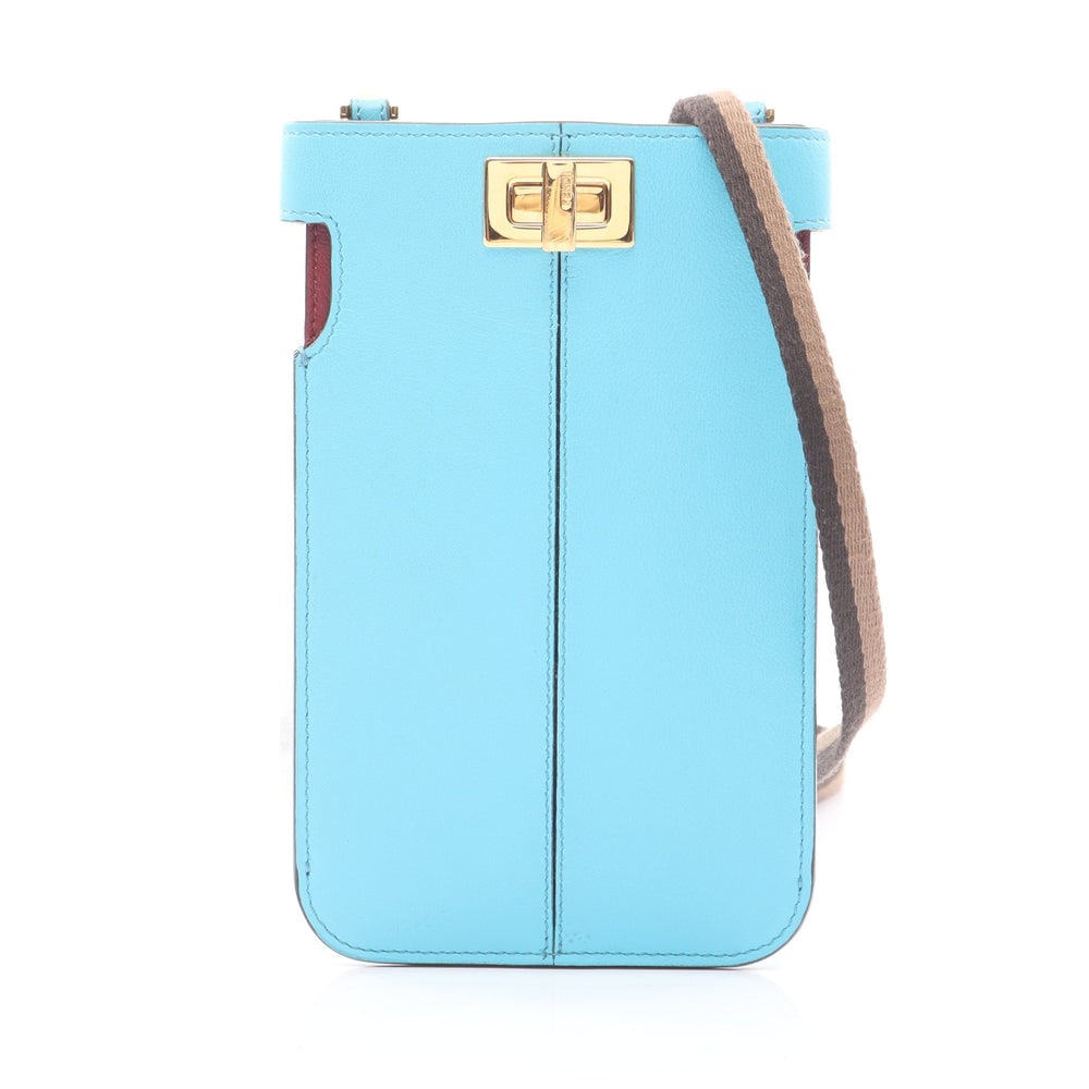 Fendi Phone Pouch Light Blue: Fendi Phone Pouch Shoulder Bag. Color: Light Blue. Material: Leather. Size: 11/10 X 17 X 1 Cm. Strap: 117 Cm.
