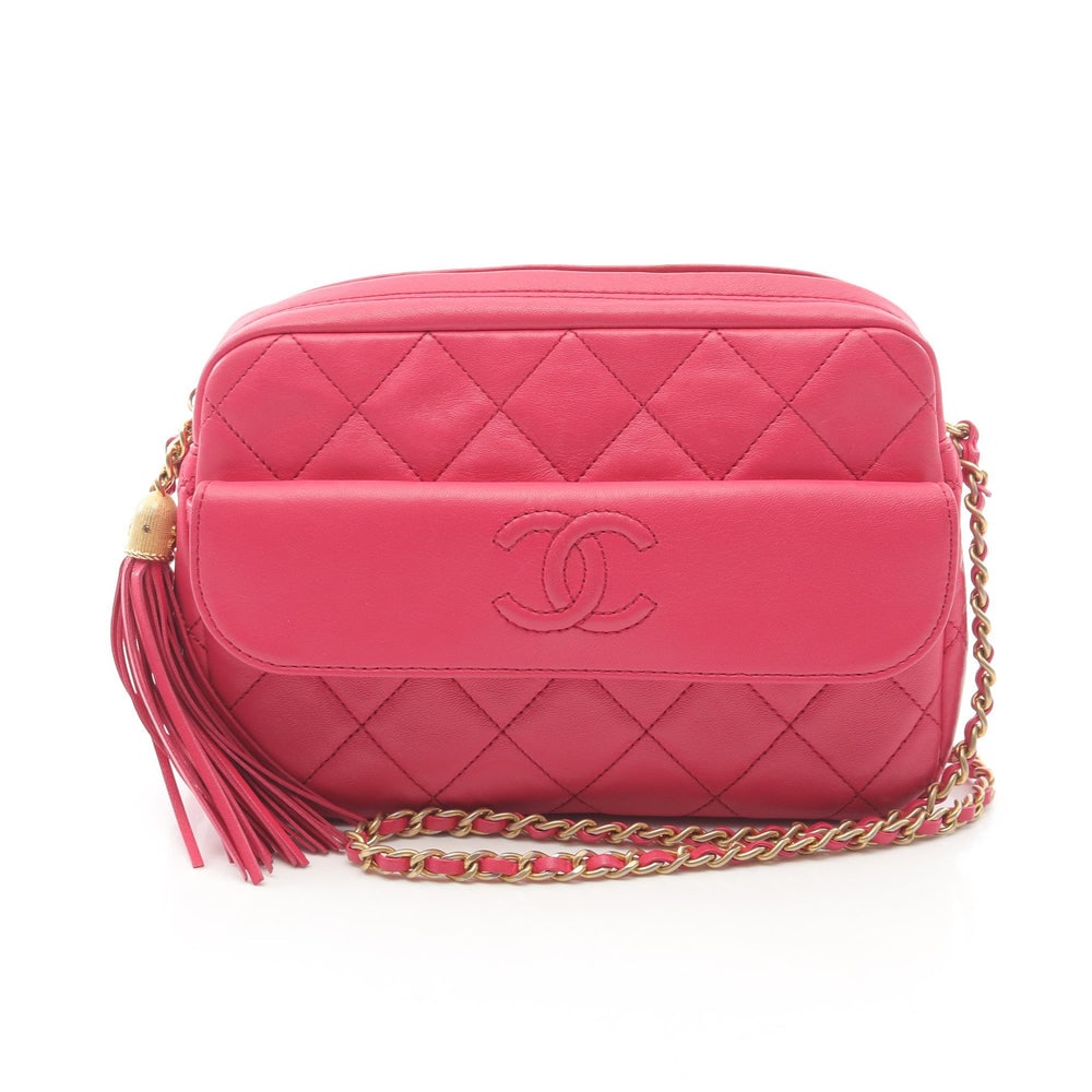 Chanel Pink Tassel Chain Bag: Pink lambskin chain shoulder bag with gold hardware and tassel; guarantee card and serial seal included; H13 x W19 x D5 cm. Authentic and authenticated.