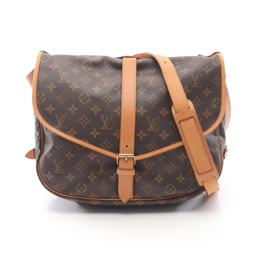Louis Vuitton Saumur 35 Monogram: Authentic and authenticated Louis Vuitton Saumur 35 Monogram shoulder bag in brown PVC leather. Model M42254, product MB0070. Approx. 28 x 34/33 cm with 13 cm gusset and 100-124 cm strap.