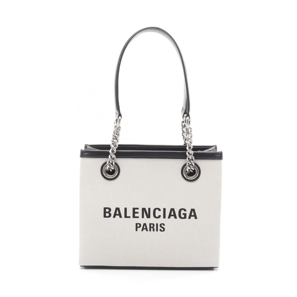 Balenciaga Duty Bree Small Tote: Authentic and authenticated Balenciaga Duty Bree Small shoulder tote in ivory black canvas leather. Model 759941. Approx. 19 x 23 x 11 cm, strap 52 cm, max drop 20 cm.