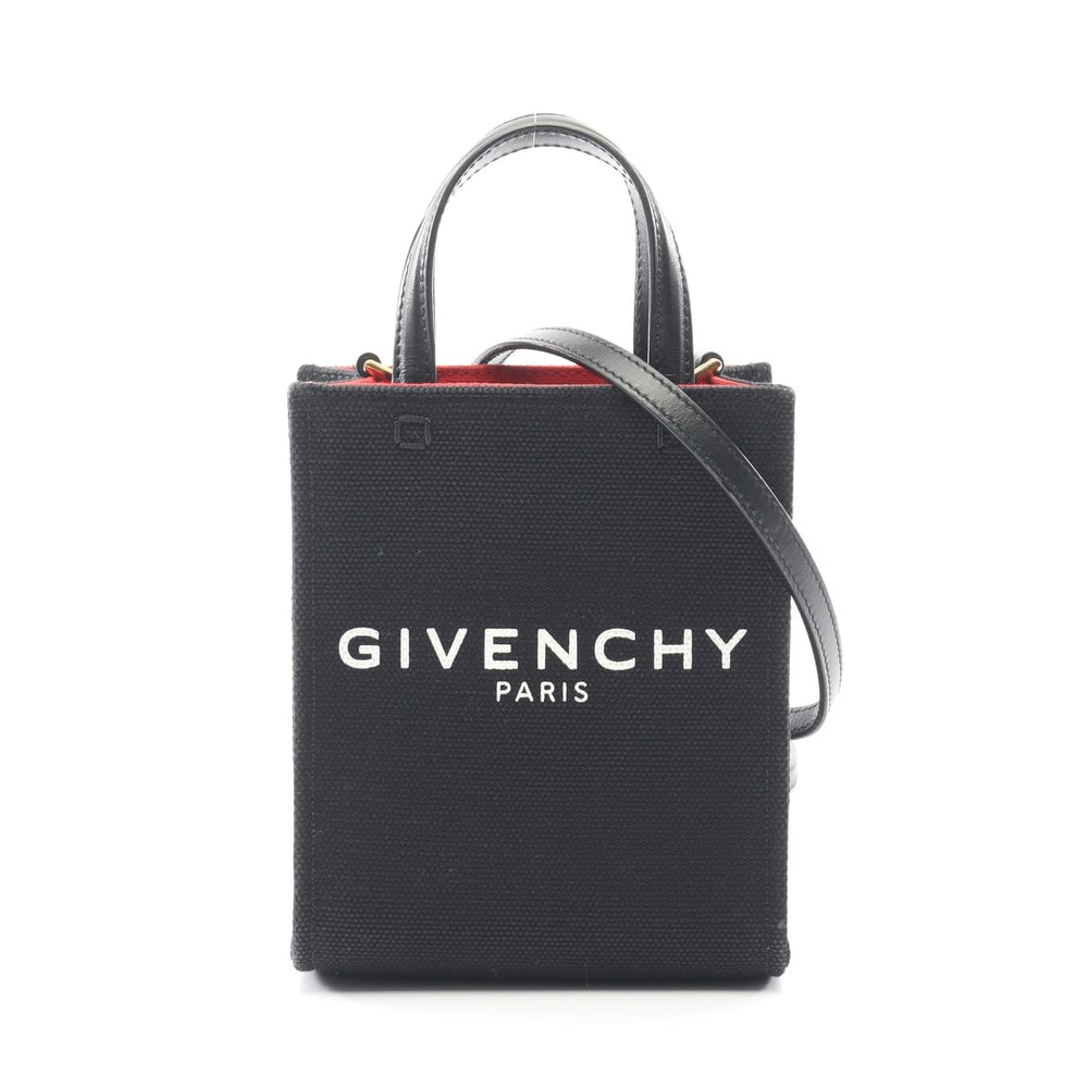 Givenchy G Tote Mini Vertical Black: Black canvas and leather 2Way mini tote. Includes shoulder strap. 13 x 16 x 6 cm.