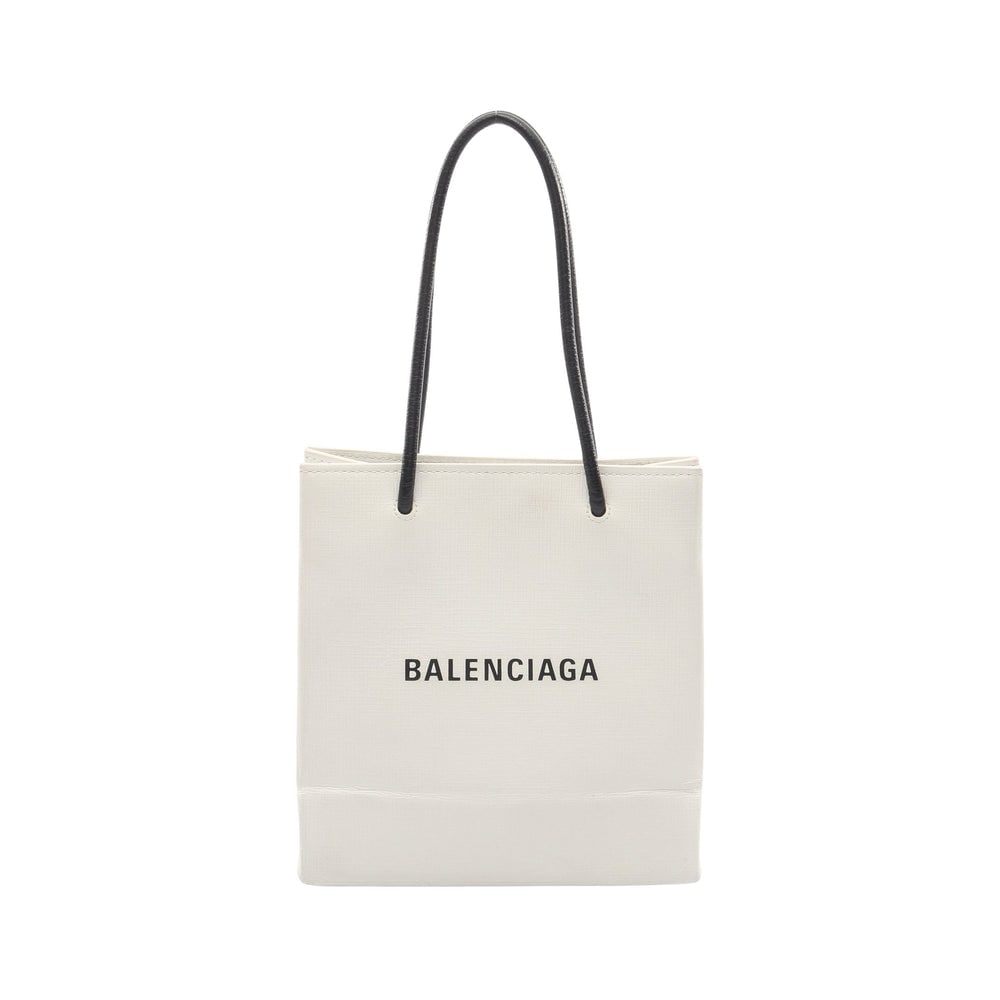Balenciaga Shopping Tote Xxs: Balenciaga Shopping Tote Xxs Handbag. Color: White Black. Material: Pvc Leather. Size: 18.5/19 X 20 X 9 Cm. Handle: 38.5 Cm.