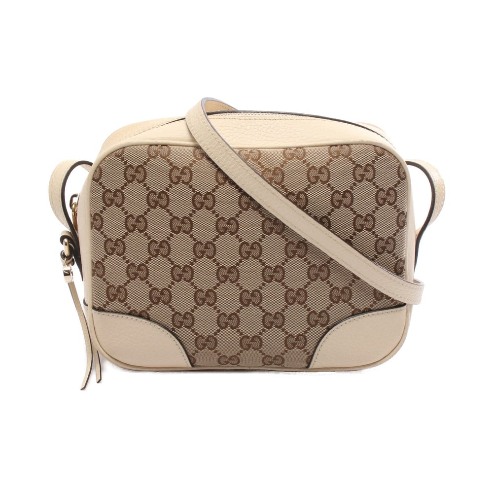 Gucci Bree GG Canvas Shoulder Bag: Authentic and authenticated Gucci Bree GG canvas shoulder bag in beige and ivory canvas leather. Model 449413. Approx. 17H x 20W x 6D cm with 126-136 cm strap.