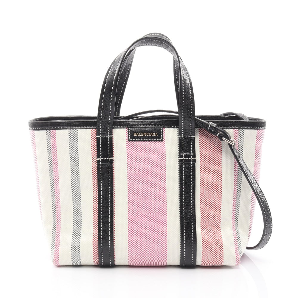 Balenciaga Barbes Canvas 2WAY Bag: Authentic and authenticated Balenciaga Barbes 2WAY handbag in white multicolor canvas. Model 671404. Approx. 20H x 31/24W x 10D cm with 30 cm handle and 96-131 cm strap. Includes shoulder strap.