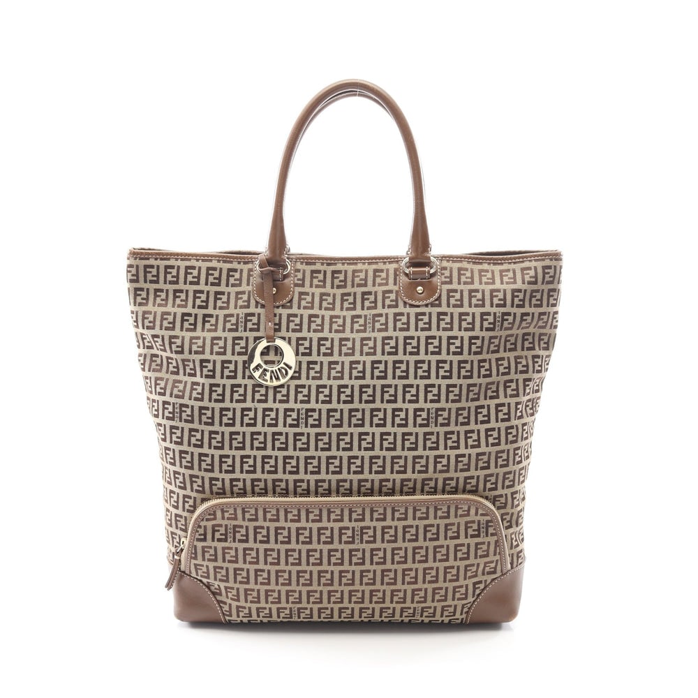 Fendi Zucchino Canvas Tote Beige: Authentic and authenticated Fendi Zucchino tote handbag in beige and brown canvas leather. Model 8BH140. Approx. 36H x 41/34W x 10D cm with 42 cm handle. Includes charm.