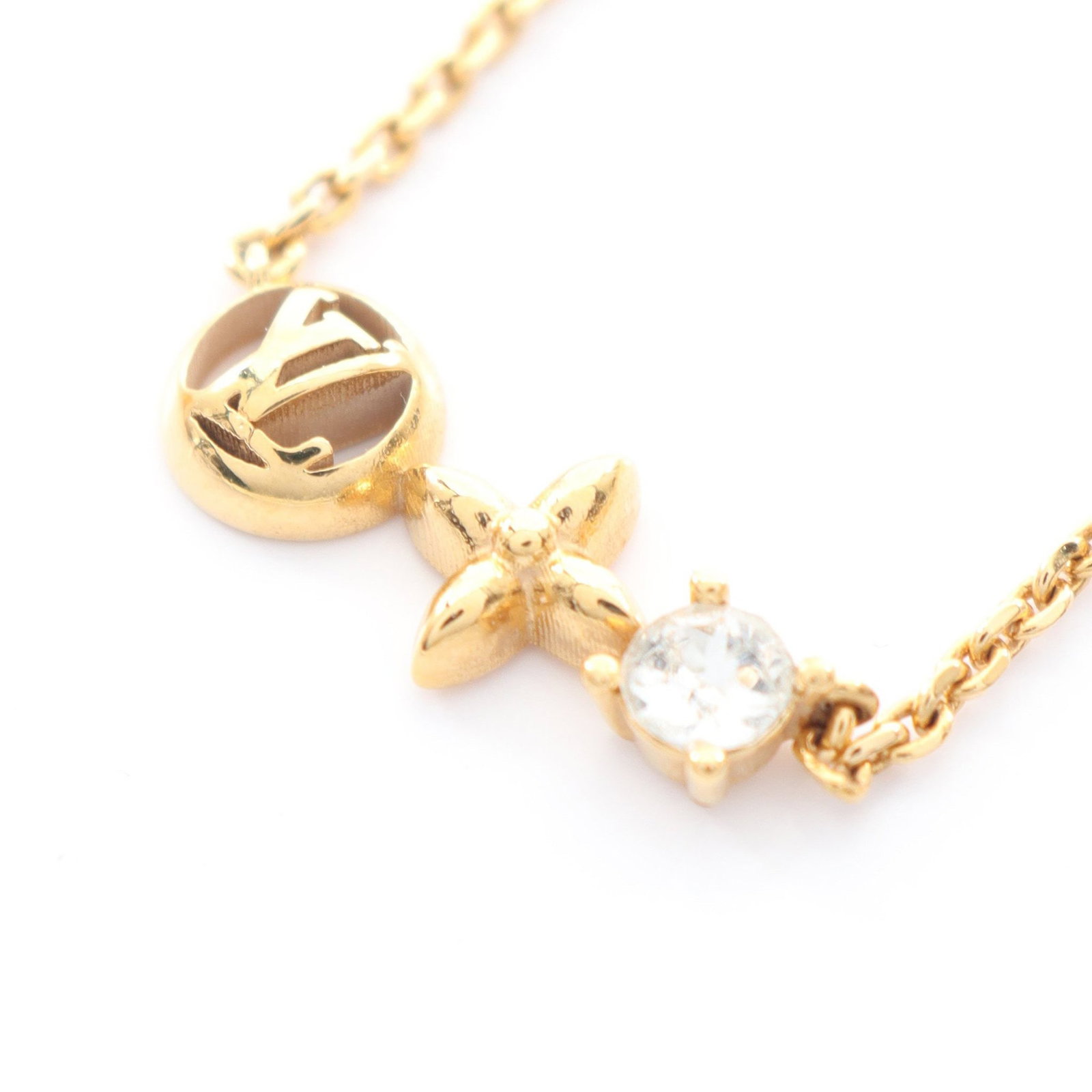 LV Petit Louis Necklace: Louis Vuitton Petit Louis necklace in GP with rhinestone, gold/clear. Listed price 54,546.00. Real and authenticated.
