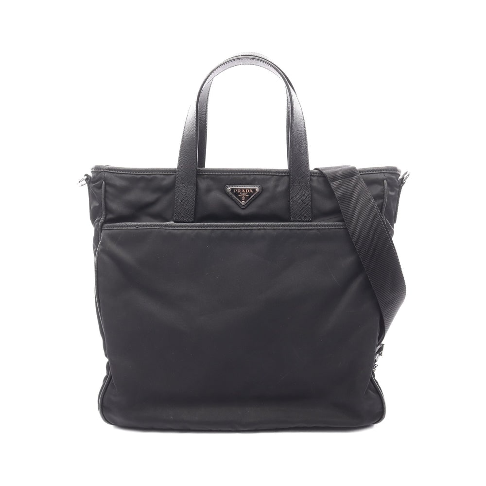 Prada Nylon Saffiano 2WAY Bag: Authentic and authenticated Prada 2WAY handbag in black nylon and saffiano leather with Prada logo plate. Approx. 33H x 39/35W x 11D cm with 35.5 cm handle and 77-130.5 cm strap.