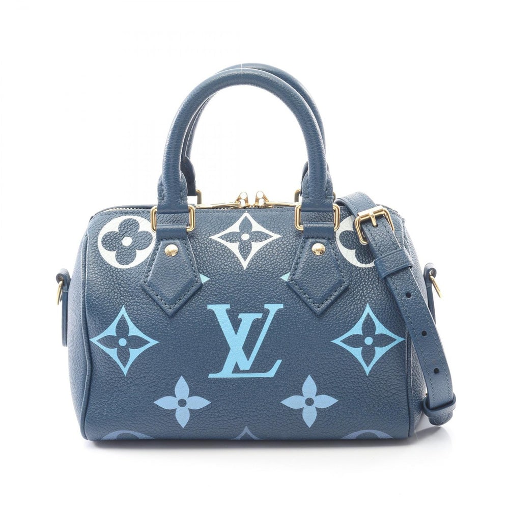 LV Speedy 20 Gradient Blue: Dark blue monogram empreinte gradient leather 2 way handbag; includes shoulder strap, padlock, and 2 keys; H16 x W20/20.5 x D11 cm. Authentic and authenticated.