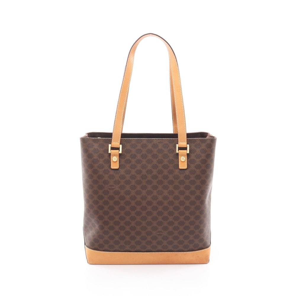 Celine Macadam Handbag Brown: Authentic and authenticated Celine Macadam handbag in dark brown and brown PVC leather. Approx. 24H x 25/23W x 10.5D cm with 47 cm handle.
