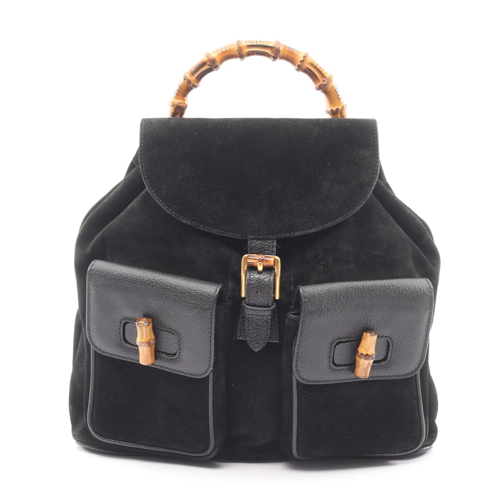 Gucci Bamboo Suede Backpack Black: Authentic and authenticated Gucci Bamboo backpack in black suede leather. Model 003 2058 0016. Approx. 32H x 31W x 11D cm with 70-82 cm straps and 26 cm handle.