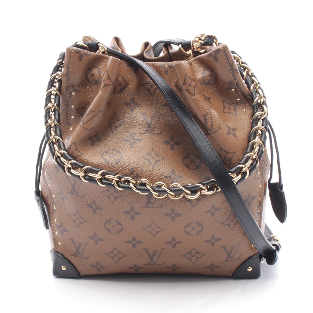 Louis Vuitton Noe Trunk 2 Way: Light brown and black monogram reverse PVC and leather 2 way handbag; includes shoulder strap; H25 x W22 x D8 cm. Authentic and authenticated.