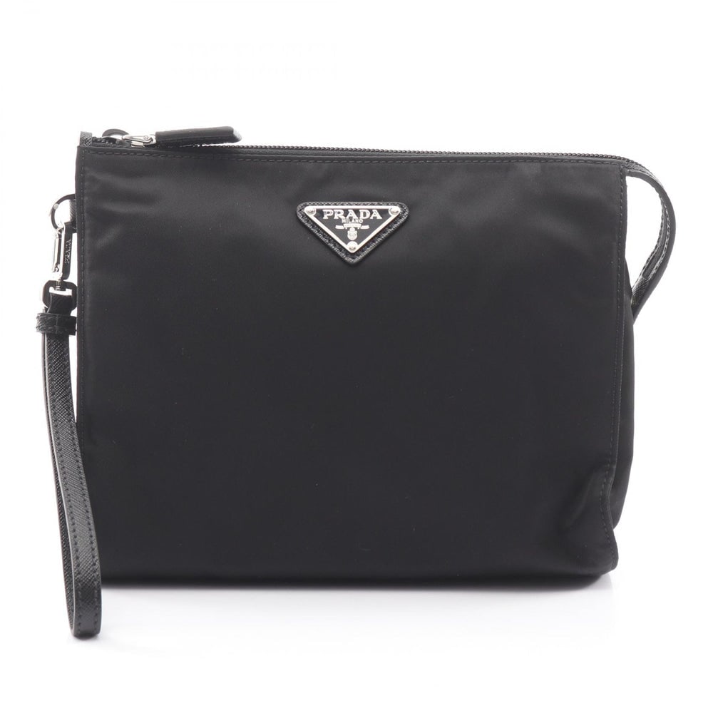 Prada Re-Nylon Necessaire Black: Black nylon and saffiano leather clutch. 22.5 x 18 x 6 cm.