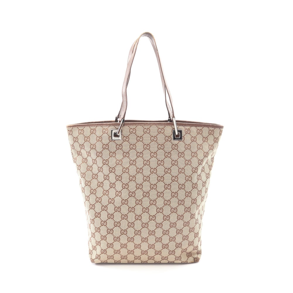 Gucci Gg Canvas Tote Beige Brown: Gucci Gg Canvas Shoulder Tote Bag. Color: Beige Dark Brown. Material: Canvas Leather. Size: 37/24 X 32 X 11 Cm. Strap: 48 Cm.