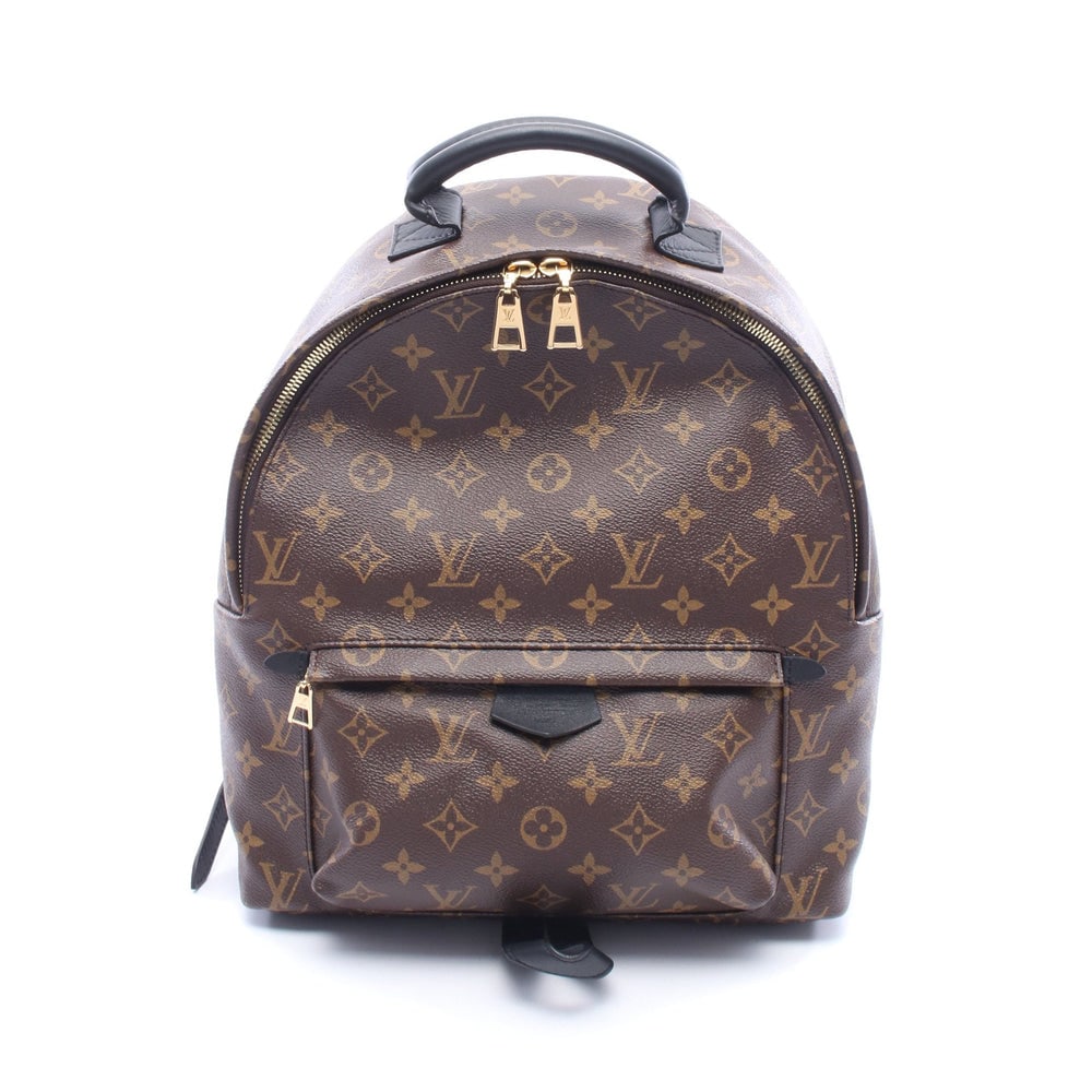 LV Palm Springs MM Brown: Brown Monogram PVC leather Palm Springs Backpack MM. Approx. 29 x 37 x 11 cm; strap 56-83 cm; handle 21 cm. Model M41561, product no. FL3158. Authentic and authenticated.