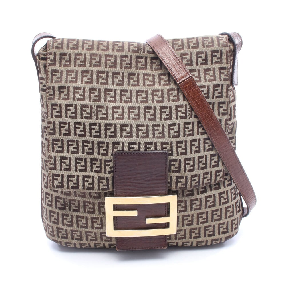 Fendi Zucchino Canvas Shoulder Bag: Authentic and authenticated Fendi Zucchino shoulder bag in beige and dark brown canvas leather. Model 8BT127. Approx. 30H x 24/25W x 4.5D cm with 122-157 cm strap.