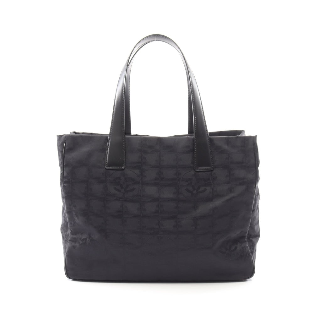 Chanel New Travel Line MM Tote Black: Authenticated genuine Chanel New Travel Line MM handbag tote in black nylon canvas and leather with gold hardware, model A15991. Includes guarantee card and serial seal, serial 938****. Approx. H25 x
