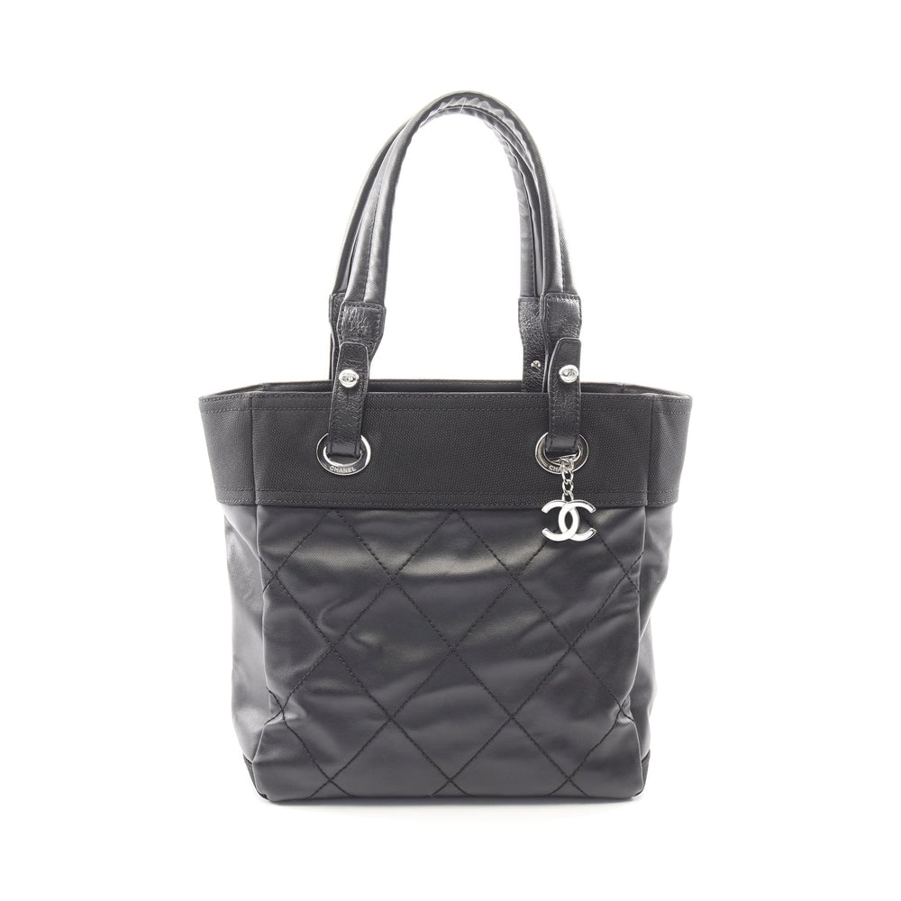 Chanel Paris Biarritz PM Tote Black: Black coated canvas and leather Paris Biarritz PM tote with silver hardware. Includes guarantee card and serial seal. Approx. 34 x 27 x 11 cm; handle 50 cm. Model A34208. Authentic and authenticated.