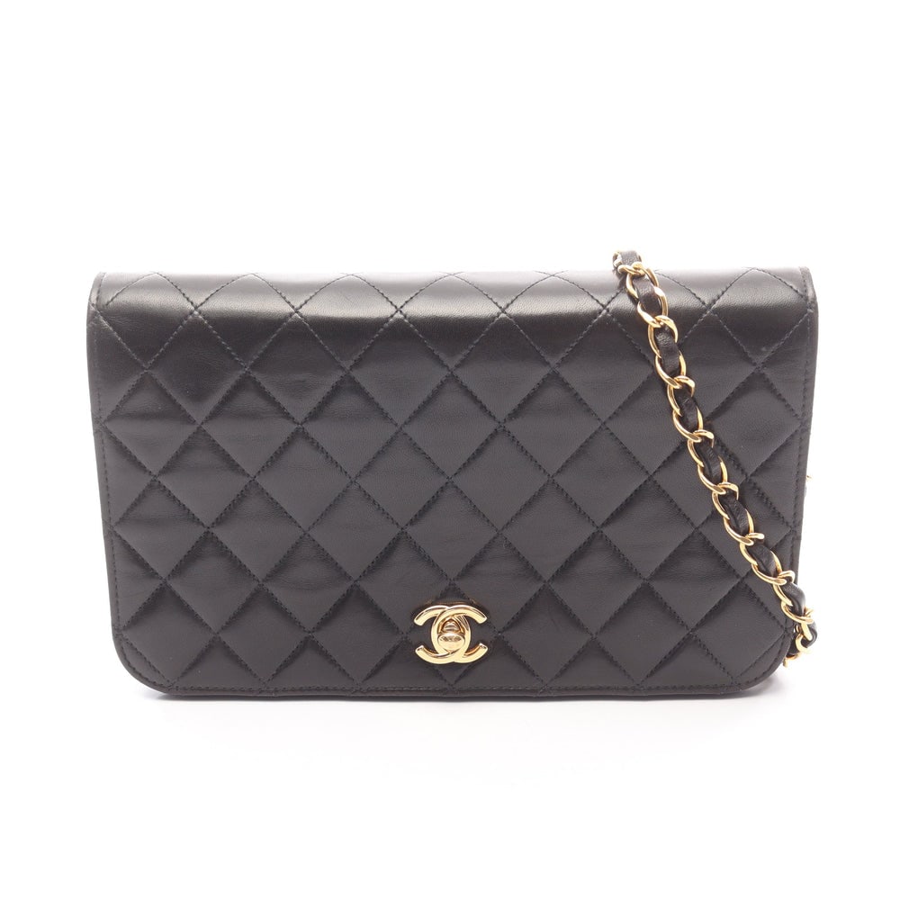Chanel Full Flap Chain Bag Black: Black lambskin full flap chain shoulder bag with gold-tone hardware.
