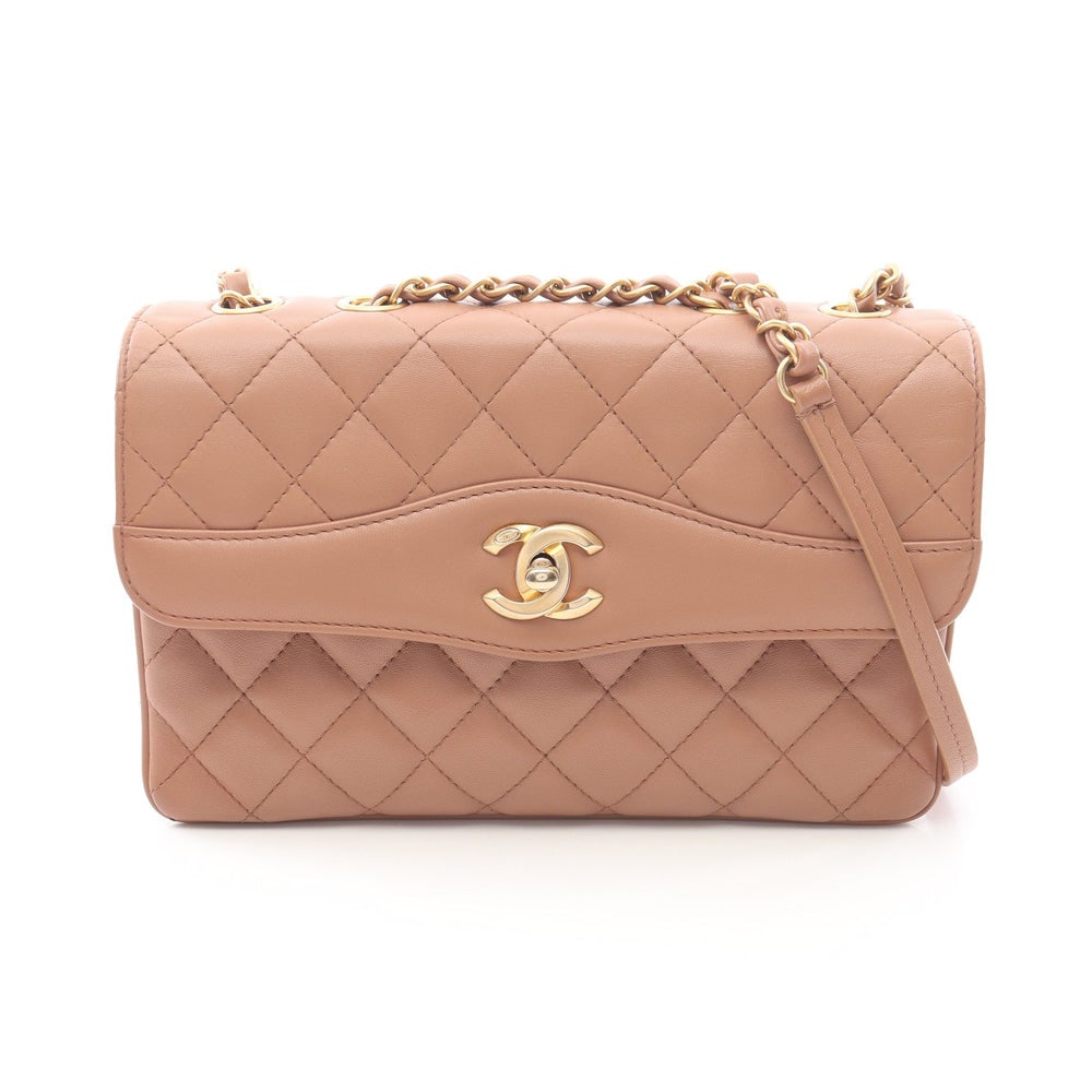 Chanel Chain Shoulder Bag Pink Beige: Pink beige lambskin chain shoulder bag.