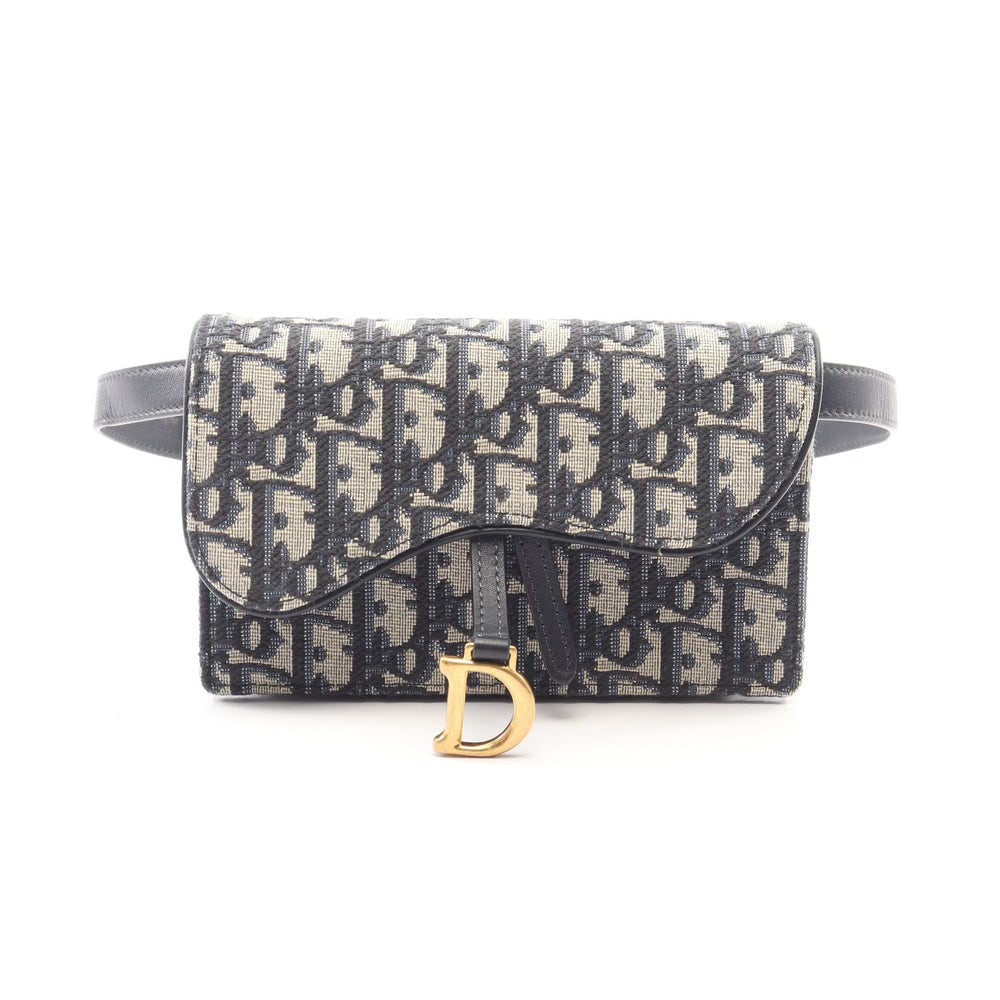 Dior Saddle Waist Bag Navy Beige: Saddle Oblique Jacquard waist bag in navy beige canvas and leather. Size 17 x 11 x 3.5 cm.