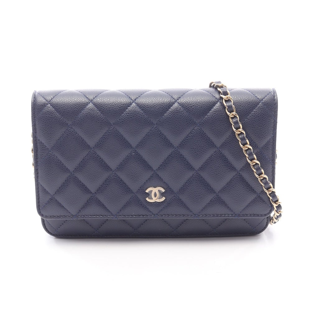 Chanel Chain Wallet Navy: Navy soft caviar skin chain wallet with gold-tone hardware.