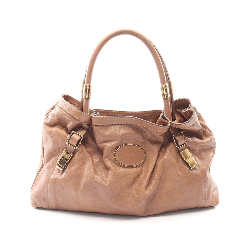 Chloe Victoria Handbag Brown: Victoria handbag in brown leather. Size 46 x 34 x 7 cm. Handle 53 cm.