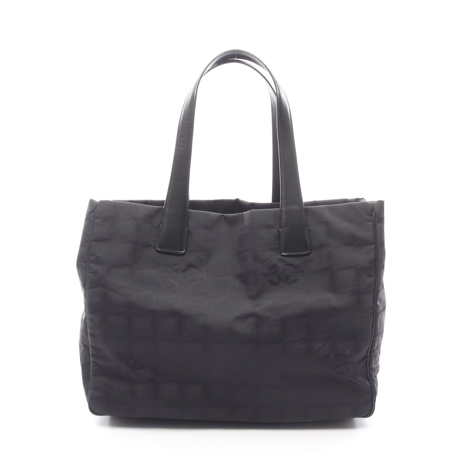 Chanel New Travel Line MM Tote: Authentic and authenticated Chanel New Travel Line MM tote in black nylon canvas and leather with gold hardware. Model A15991 with serial seal and serial 844****. Approx. 25H x 33/34W x 14.5D cm with