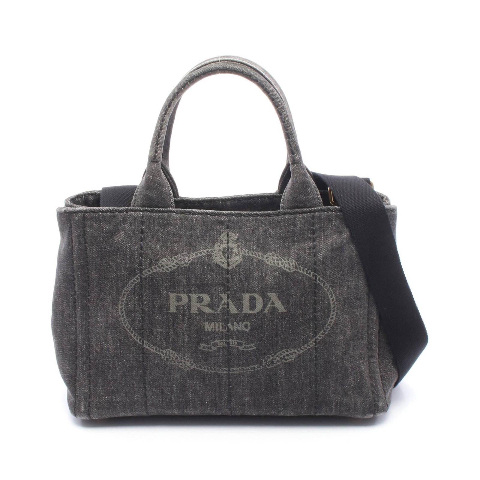 Prada Denim Canapa 2WAY Tote Black: Authentic and authenticated Prada Denim Canapa 2WAY tote handbag in black denim. Model B2439G. Approx. 19H x 28/28.5W x 15D cm with 28 cm handle and 72-123 cm strap. Includes strap and guarantee card.