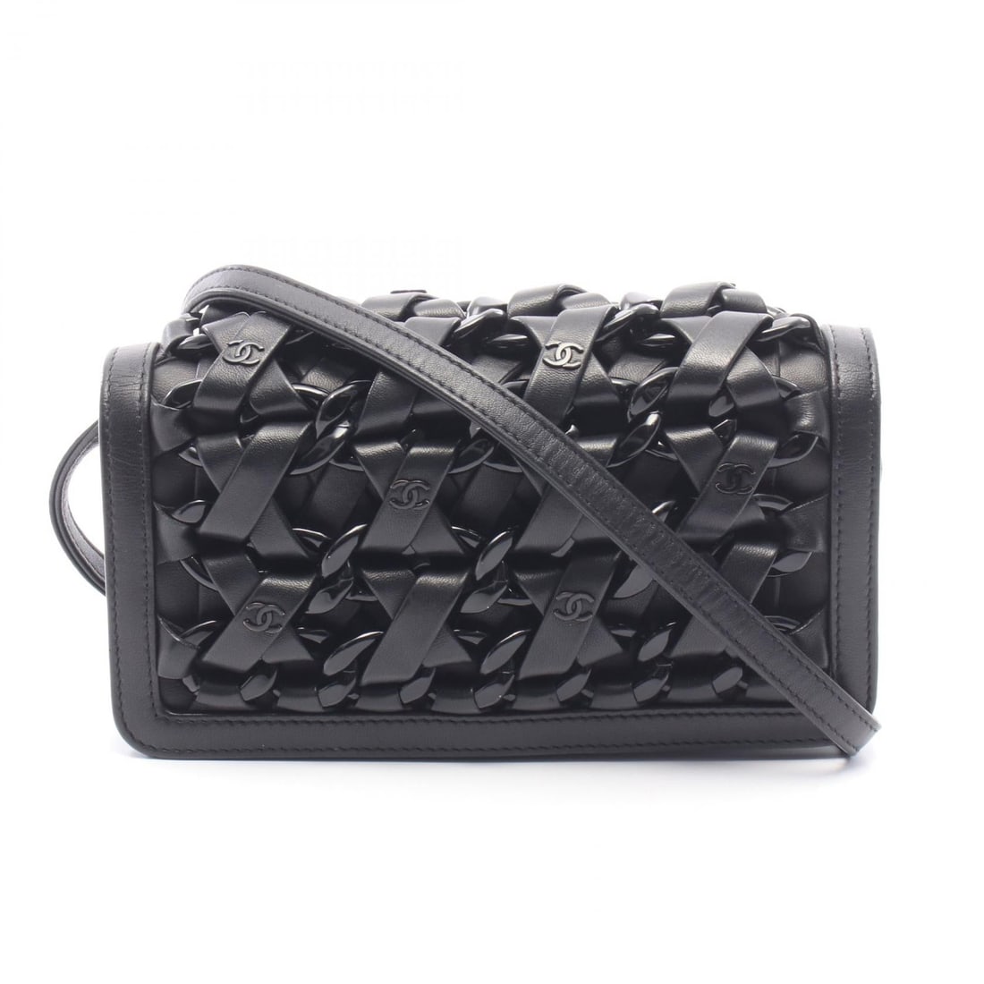 Chanel Interlace Coco Mark Bag: Authentic and authenticated Chanel Interlace Coco Mark shoulder bag in black lambskin with black hardware. Approx. 11.5H x 19.5W x 5D cm with 132 cm strap. Includes serial seal.