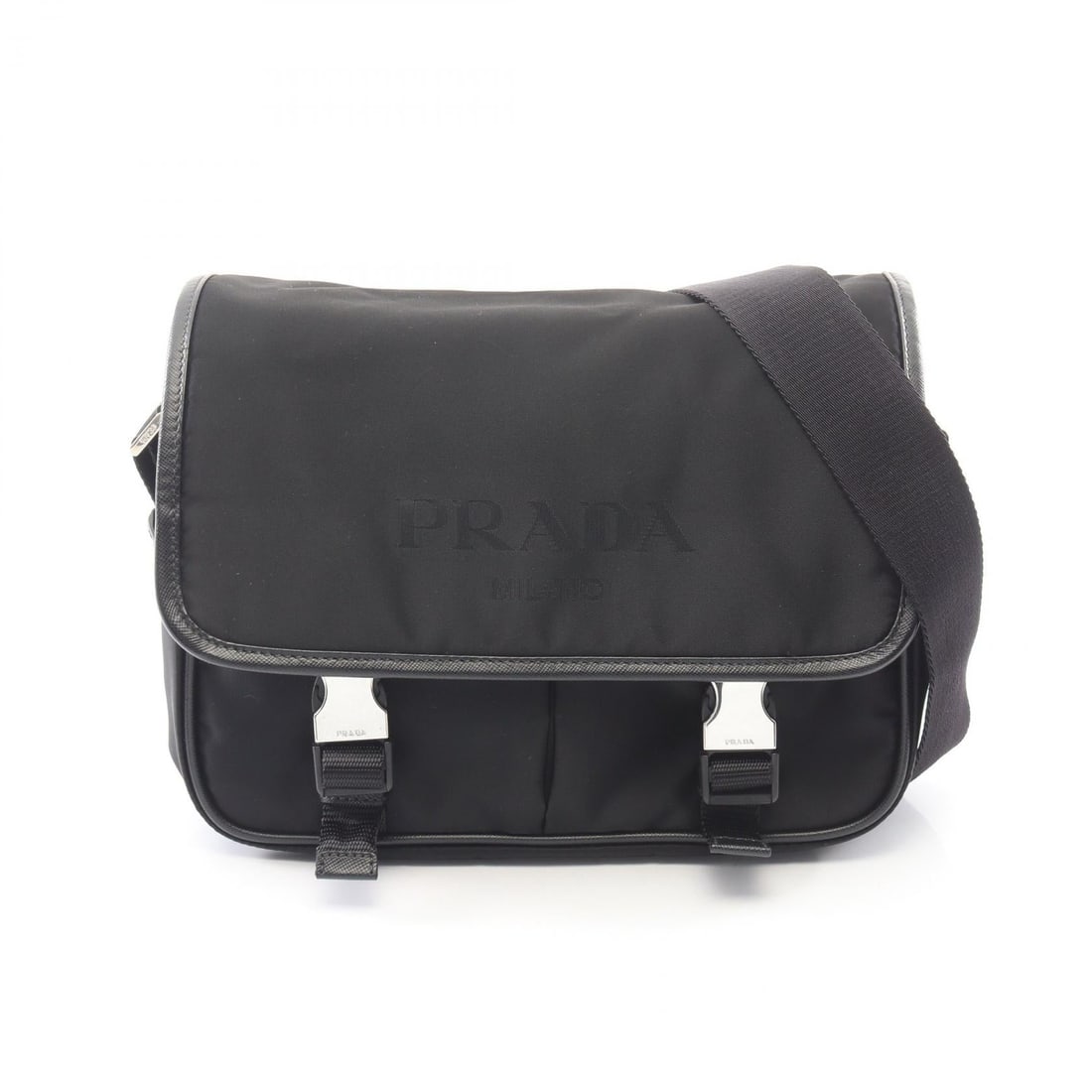 Prada Nylon Saffiano Shoulder Bag: Authentic and authenticated Prada shoulder bag in black nylon and saffiano leather. Model 2VD769. Approx. 20H x 26/25W x 3.5/6.5D cm with 75-139 cm strap.