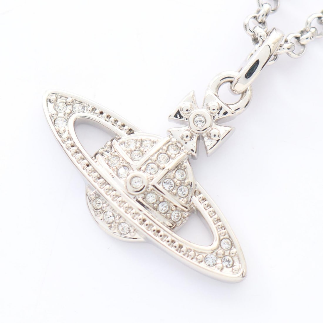 VW Mini Bus Relief Necklace: Vivienne Westwood Mini Bus Relief necklace in stainless steel with rhinestone, silver/clear. Listed price 26,364.00. Real and authenticated.