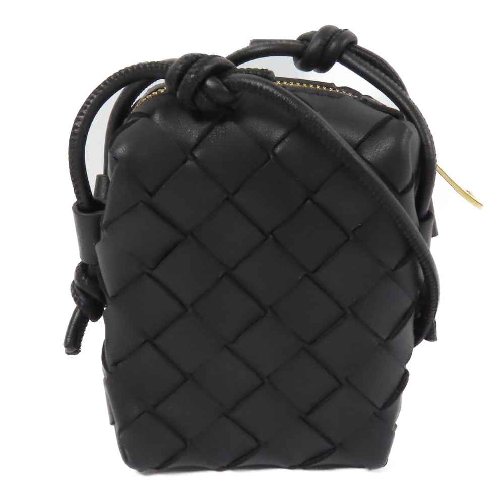 Bottega Micro Shoulder Bag: Authentic and authenticated Bottega Veneta Micro shoulder bag in black lambskin leather. Product V4W51. Includes storage bags. Approx. 9 x 10.5 x 5 cm with 110 cm shoulder strap.