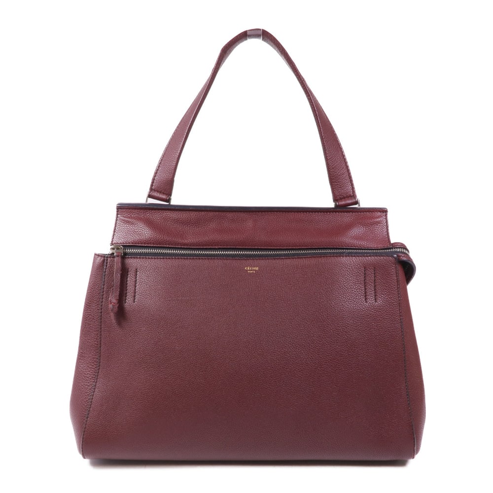 Celine Edge Medium Handbag Bordeaux: Authenticated genuine Celine Edge Medium handbag in bordeaux calfskin leather with silver-tone hardware. Includes storage bags. Product no. W-PA-0163. Approx. W34 x H26 x D16 cm with 45 cm handle.