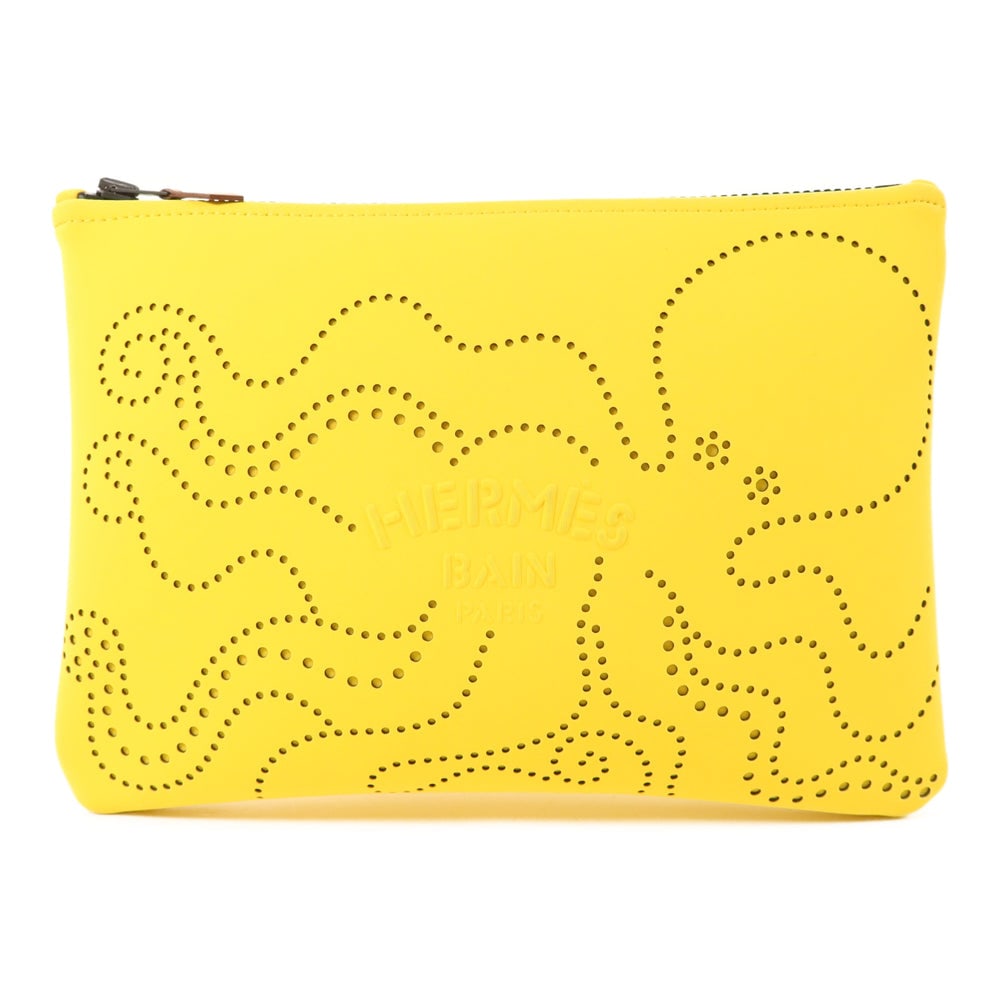 Hermes Neobain Medium Clutch Yellow: Authentic and authenticated Hermes Neobain Poulpe Fiction Case Medium clutch bag in yellow polyamide. Approx. 28W x 19.5H x 2D cm. No accessories listed.