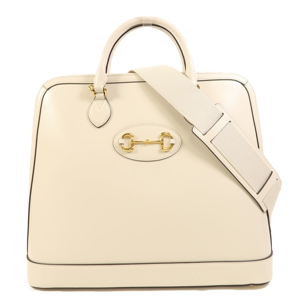 Gucci 1955 Horsebit 2Way Bag: Authentic and authenticated Gucci 1955 Horsebit 2WAY shoulder bag in white calfskin leather. Product 520981. Includes shoulder strap. Approx. 38.5 x 35 x 13.5 cm, handle 34 cm.