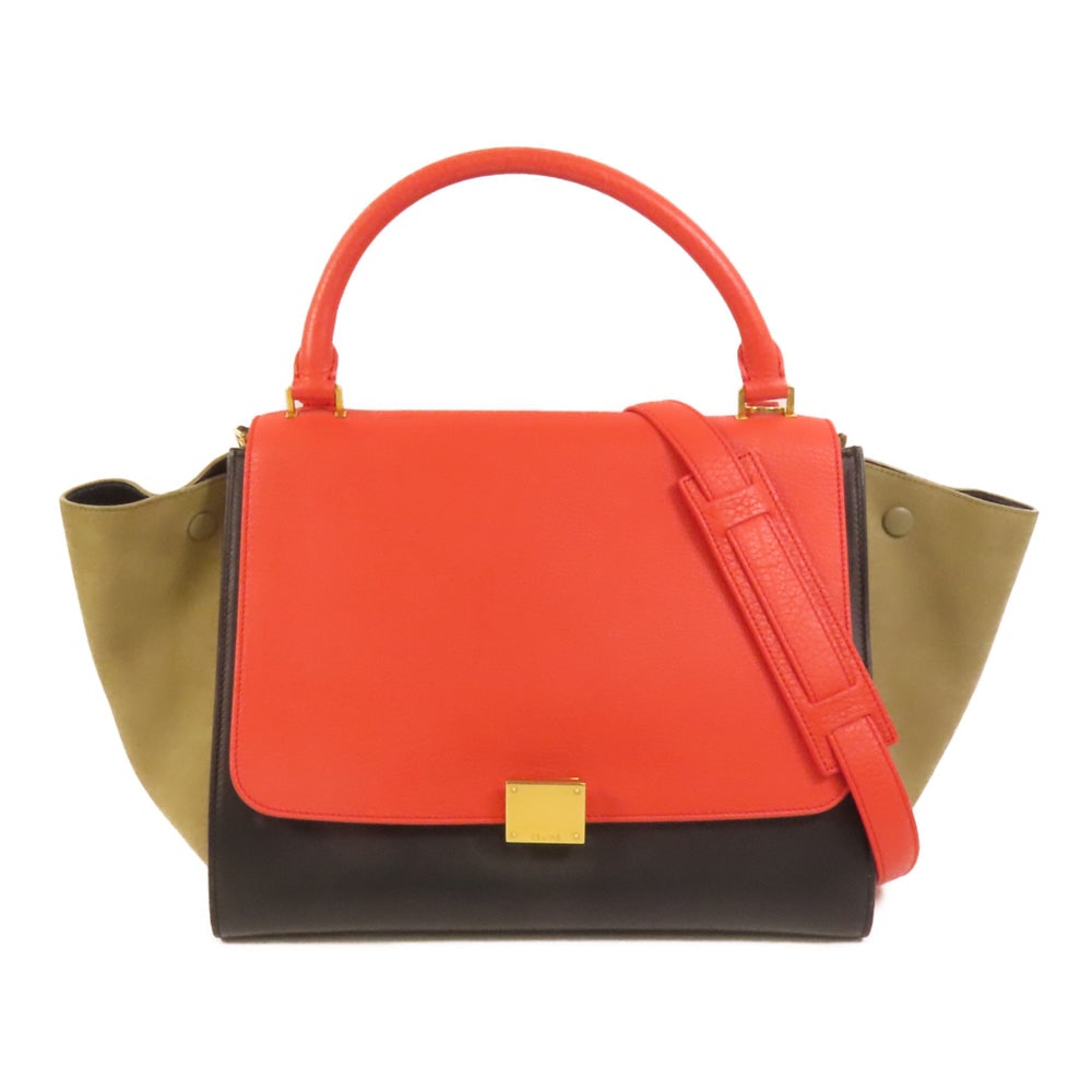 Celine Trapeze 2 Way Black: Authentic and authenticated Celine Trapeze 2 Way shoulder bag in black calfskin suede. Product no. F-CU-0164. Approx. 30W x 23H x 18D cm with 38 cm handle and 78 cm strap. Includes storage bags and