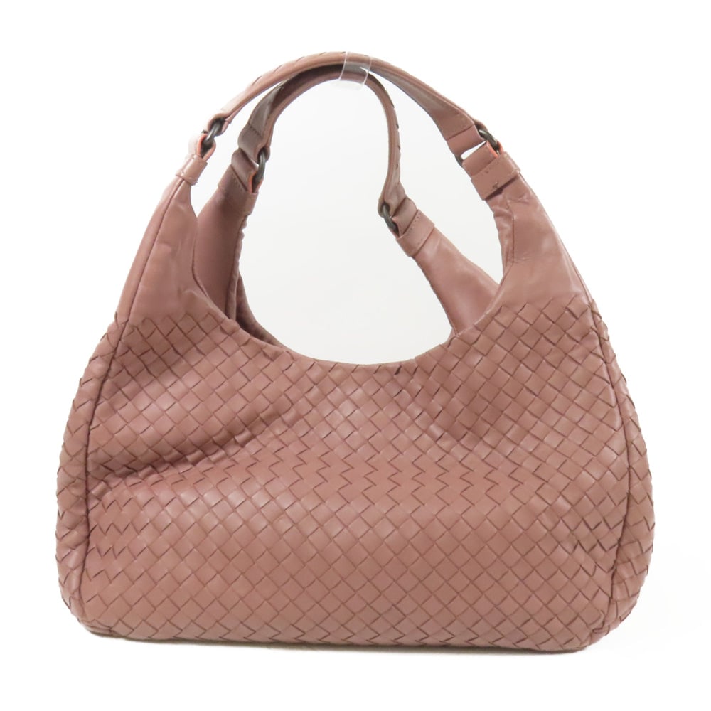 Bottega Veneta Pink Shoulder Bag: Authentic and authenticated Bottega Veneta shoulder bag in pink leather. Product B01975587R. Includes storage bags. Approx. 34 x 19 x 13 cm with 42 cm shoulder strap.