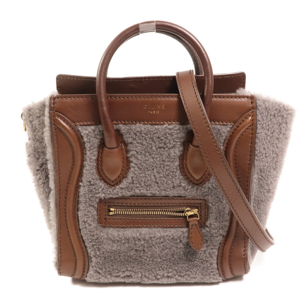 Celine Nano Luggage Shearling Bag: Authenticated genuine Celine Nano Luggage 2-way shoulder bag in gray brown calfskin and wool shearling with gold-tone hardware. Includes shoulder strap. Product no. W.ZP.0171. Approx. W20 x H19 x D10 