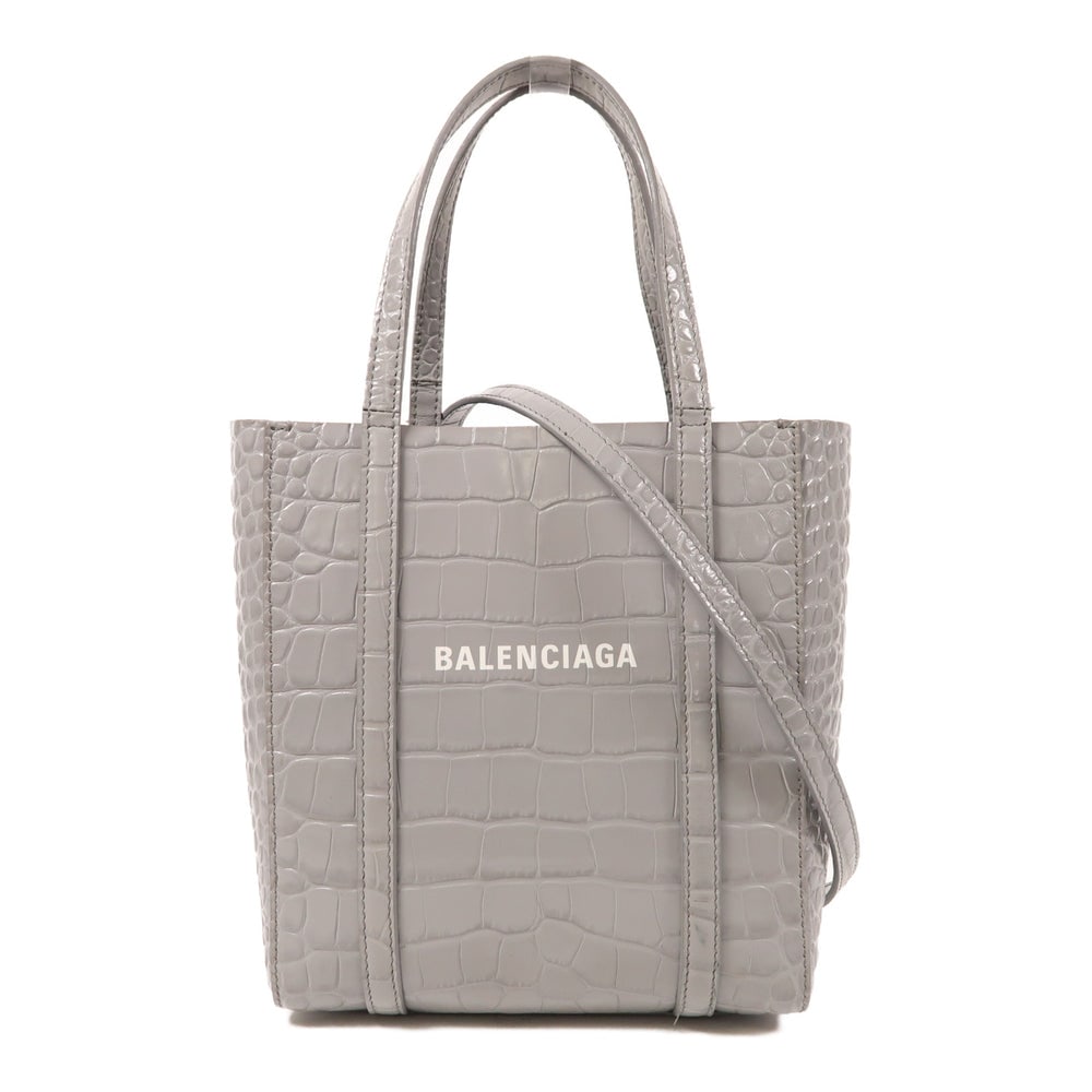 Balenciaga Everyday Tote Gray 2Way: Authenticated genuine Balenciaga Everyday Tote 2-way shoulder bag in gray calfskin leather with silver-tone hardware. Includes shoulder strap. Product no. 1108.7.535269. Approx. W19 x H21 x D9 cm.