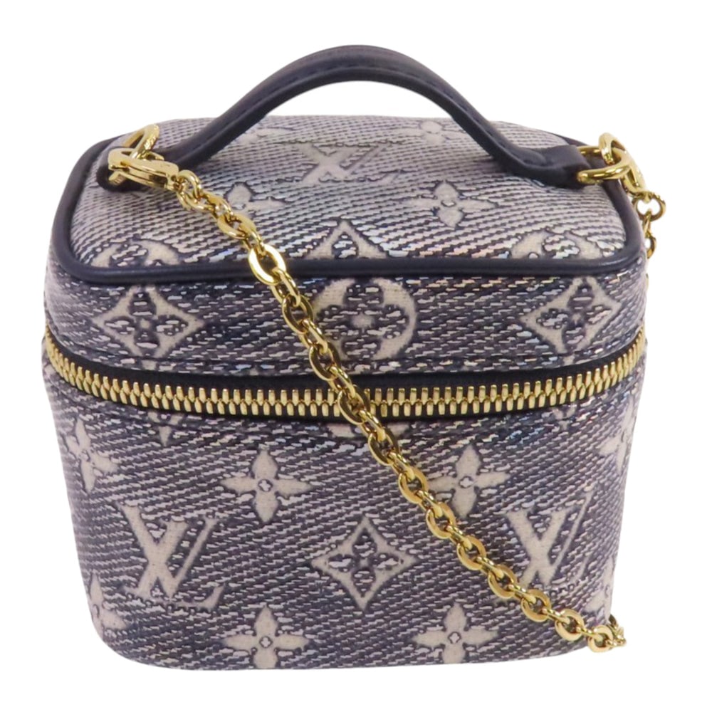 LV Micro Vanity Blue: Blue PVC coated canvas Micro Vanity handbag shoulder bag with storage bags and shoulder strap. Approx. 12 x 9.5 x 8 cm; handle 9 cm; strap 107 cm. Authentic and authenticated.