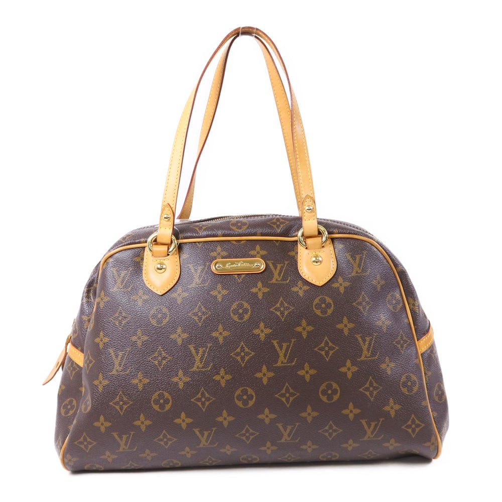 Louis Vuitton Montorgueil GM Monogram: Authenticated genuine Louis Vuitton Montorgueil GM shoulder bag in brown Monogram PVC coated canvas with gold-tone hardware. Includes storage bags. Product no. MI1078. Approx. W38 x H22 x D17 cm.