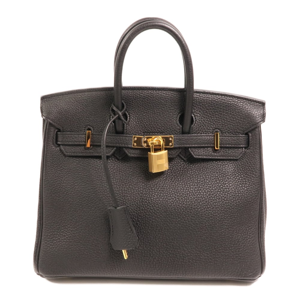 Hermes Birkin 25 Black: Black togo leather handbag with gold hardware. Includes storage bag clochette key and cadena. 25 x 20 x 13 cm.