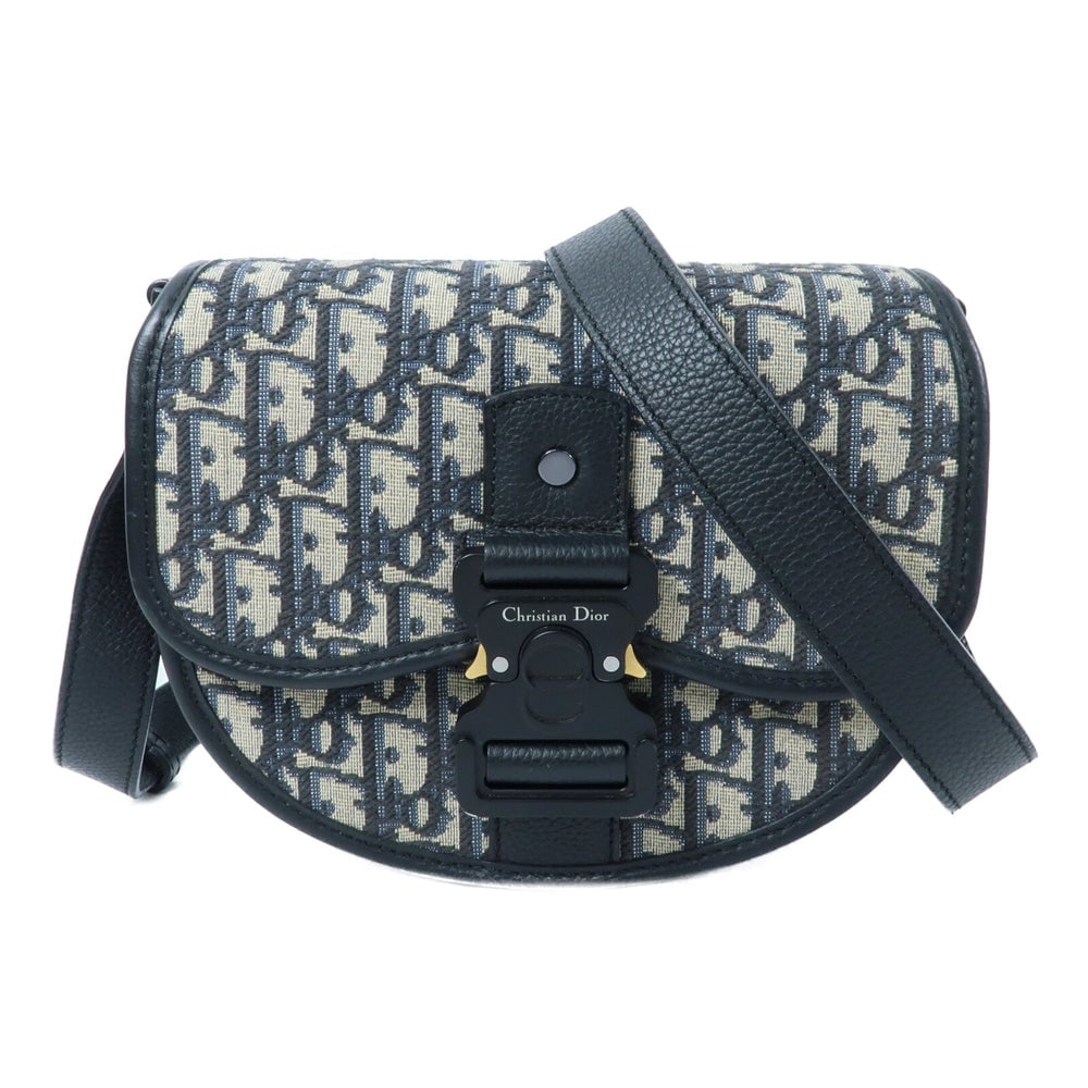 Dior Mini Gallop Shoulder Bag: Navy canvas mini shoulder bag; W20 x H16 x D6 cm; strap 96-124 cm. Authentic and authenticated.