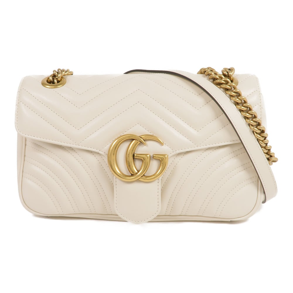 Gucci Marmont Shoulder White: White lambskin Gucci GG Marmont shoulder bag with storage bags. Approx. 25 x 15 x 7 cm; strap 68-113 cm. Product no. 495151. Authentic and authenticated.