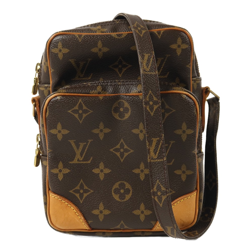 Louis Vuitton Amazon Monogram Bag: Authenticated genuine Louis Vuitton Amazon shoulder bag in brown Monogram PVC coated canvas with gold-tone hardware. Product no. TH2017. Approx. W15 x H21.5 x D9 cm; shoulder 108-125.5 cm.